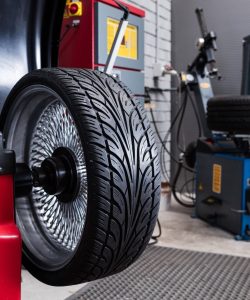 Tire mounted on a wheel-balancing machine